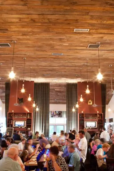 Interior of a restaurant with people dining